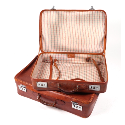 431 - Two vintage Harrods leather suitcases with combination locks, 66cms and 57cms wide (2).