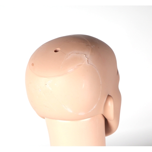 404 - A shop display mannequin head and shoulders, 52cms high.(a/f)