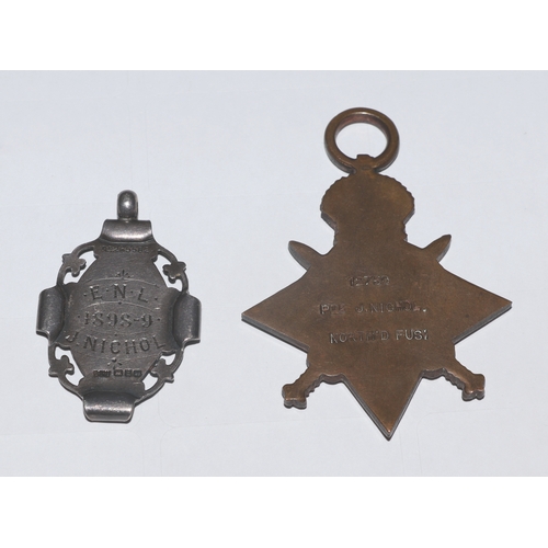 66 - A WWI medal pair named to 'PTE. J. Nichol North. D. FUS. 12750'; together with a silver Services Ren... 