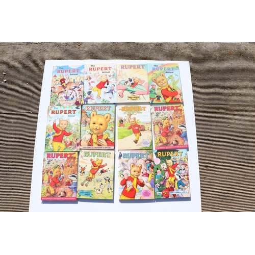 52 - A large quantity of Rupert the Bear annuals.