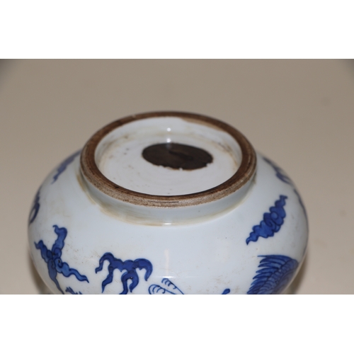 707 - A Chinese blue & white bowl decorated with dragons amongst clouds, 12cms diameter; together with a b... 