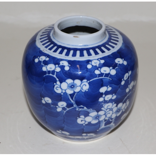 645 - A Chinese blue & white baluster vase decorated with prunus, 25cms high; together with two similar gi... 