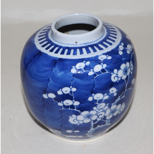 645 - A Chinese blue & white baluster vase decorated with prunus, 25cms high; together with two similar gi... 