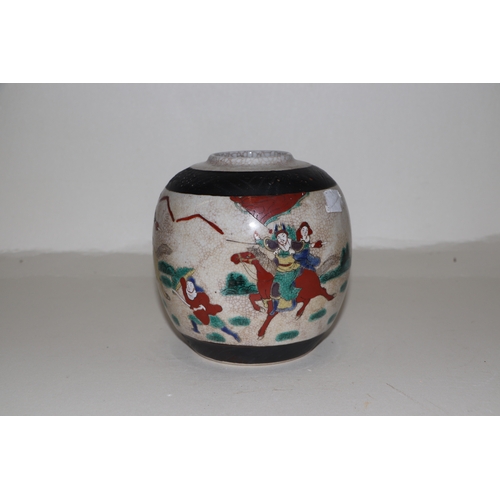 659 - A Chinese famille rose crackleware ginger jar and cover decorated with warriors, four character inci... 