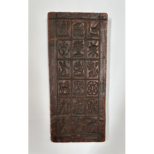 390 - A moulded wax printing block, 22 by 10cms.