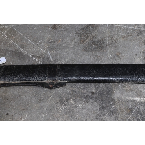 103 - An Asian sword in metal bound leather scabbard, overall 96cms long.