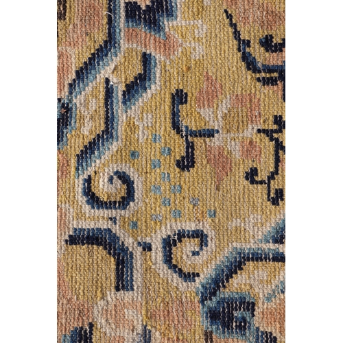 133 - A Chinese Ningxia meditation mat with floral design on a beige ground, 68 by 70cms.