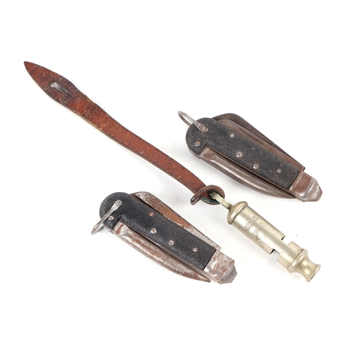 103 - A 1940 dated J. Hudson & Co. whistle with Sam Browne strap and two British Army penknives (3)