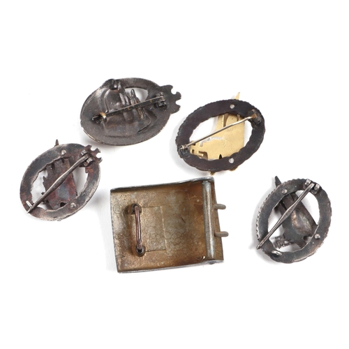 130 - A German breast order, belt buckle, SS type desk seal, surmounted a scull, badges and epaulettes.