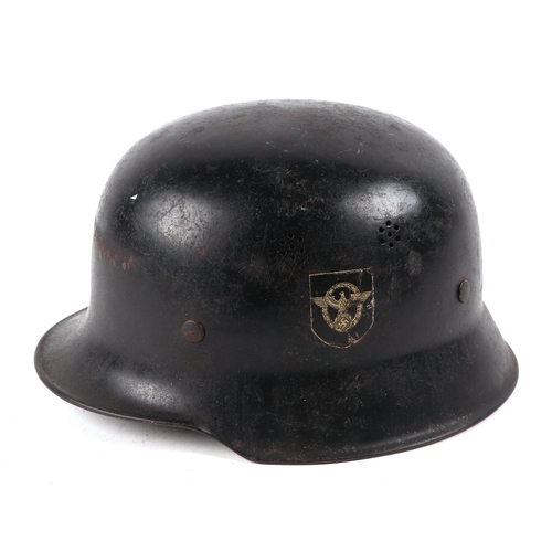 131 - A WWII German Third Reich helmet, with double decal, possibly NSK with leather liner.