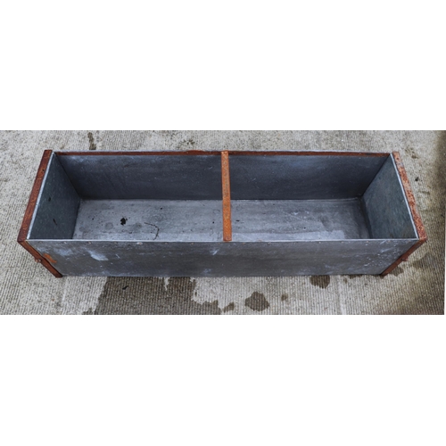 14 - A galvanised rectangular planter, 121cm wide.