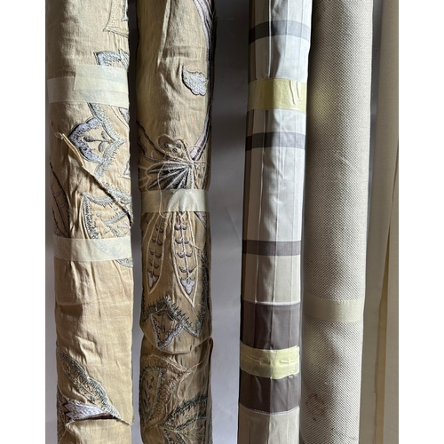 158 - A quantity of upholsterers remnant fabric rolls , various makes, designs and quantities, (We recomme... 