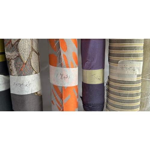 161 - A quantity of upholsterers remnant fabric rolls, various makes, designs and quantities, (We recommen... 