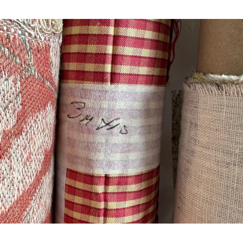 164 - A quantity of upholsterers remnant fabric rolls, various makes, designs and quantities, together wit... 