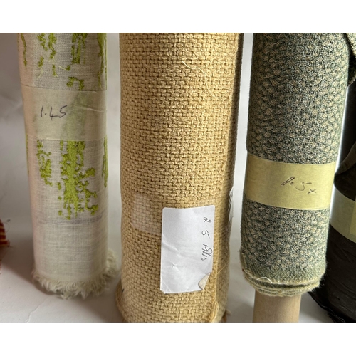 164 - A quantity of upholsterers remnant fabric rolls, various makes, designs and quantities, together wit... 