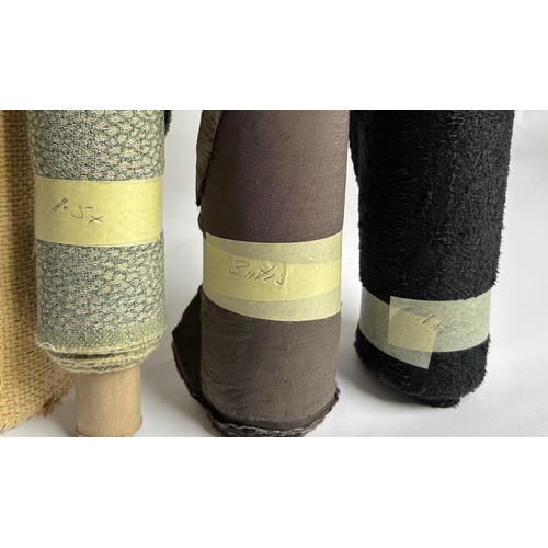 164 - A quantity of upholsterers remnant fabric rolls, various makes, designs and quantities, together wit... 