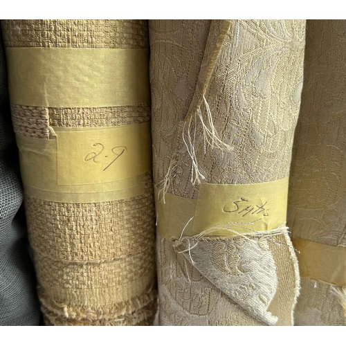 165 - A quantity of upholsterers remnant fabric rolls, various makes, designs and quantities, (We recommen... 