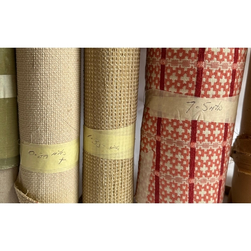 166 - A quantity of upholsterers remnant fabric rolls, various makes, designs and quantities, (We recommen... 