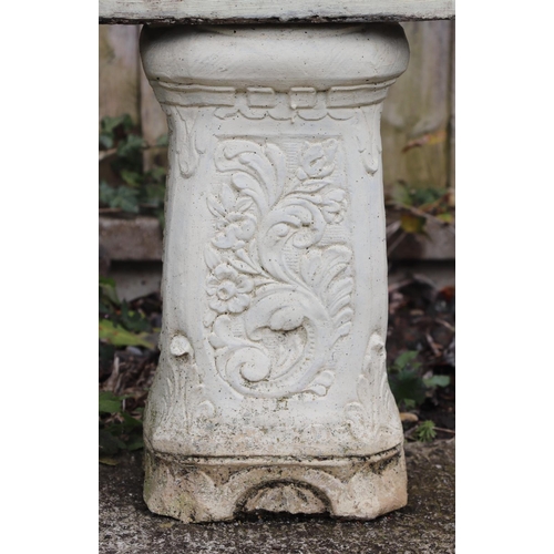 19 - A stone rectangular planter, on two square column supports, 107cm wide.