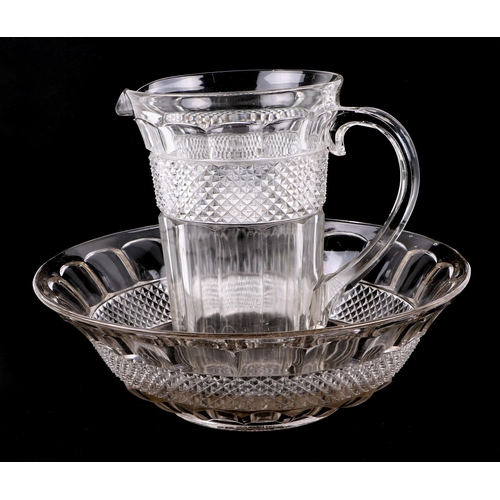 271 - A glass jug and wash bowl set, with hobnail decoration, bowl 39cm diameter, jug 27cm high (2).