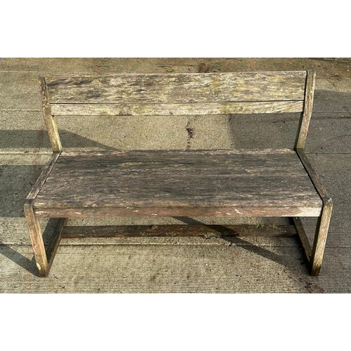 29 - A well weathered teak garden set consisting of a rectangular table, 169cm long; two benches and two ... 