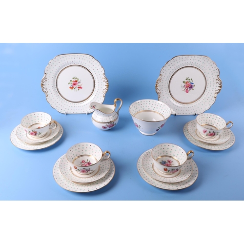 305 - An early 19th century 40 piece porcelain tea set, with hand painted floral decoration, possibly Coal... 