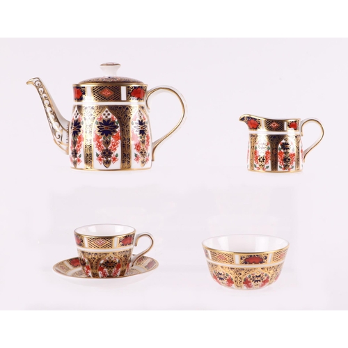 311 - A Royal Crown Derby Imari pattern miniature Batchelors tea set comprising teapot, sucrier, cup, sauc... 