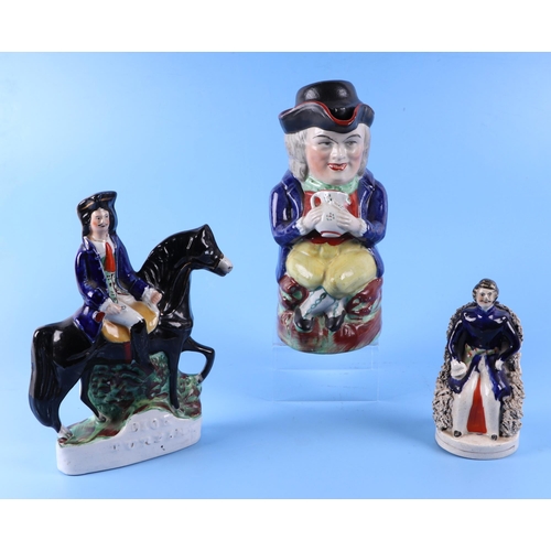 314 - A group of 19th century Staffordshire figures, to include Dick Turpin, 22cm high, a pair of recumben... 