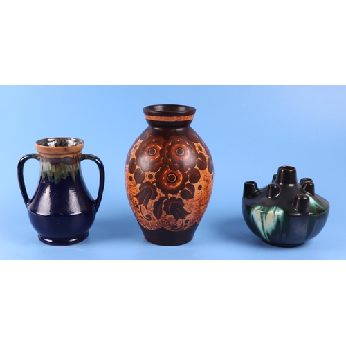 322 - A quantity of West German pottery vases and jugs, largest 40cm high.