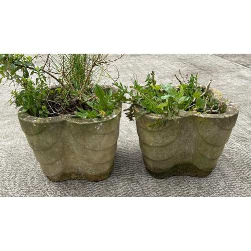 36 - A pair of well weathered stoneware garden lobed form planters, 34cm diameter (2).