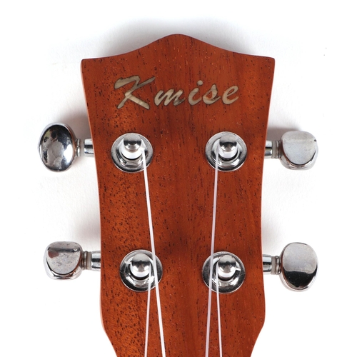 362 - A Kmise ukulele , model M10600, with soft carry case.