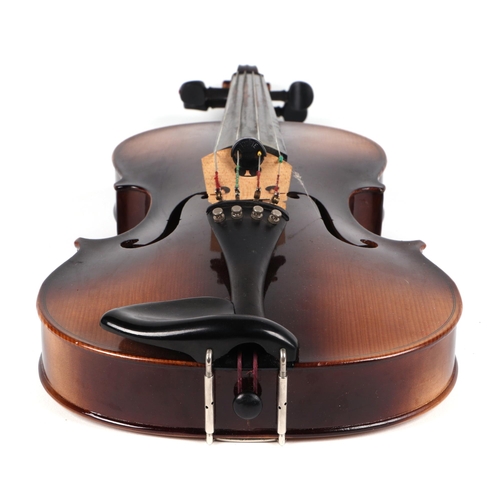 368 - A violin with 15cm two-piece back, bears ARTA paper label, with bow and bridge, cased