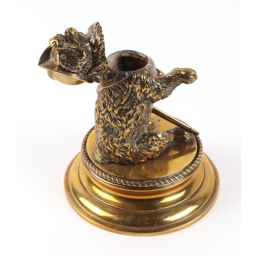 375 - A 19th century brass inkwell, modelled as a bear wearing a helmet and sword, 19cm high.