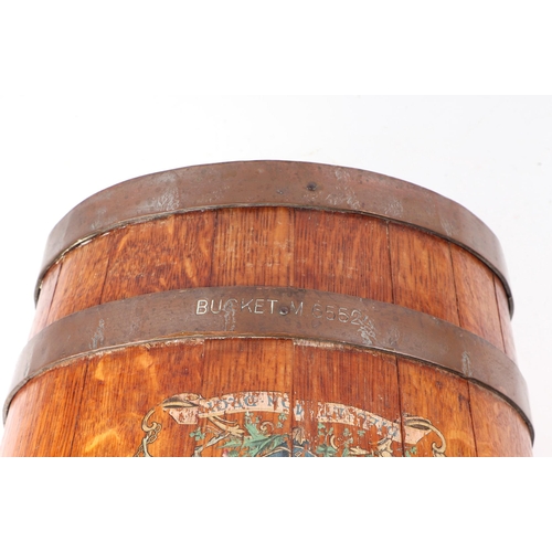 397 - A 19th century copper bound oak peat or fire bucket, with Royal Coat of Arms and original leather bo... 