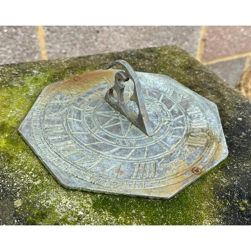 4 - A well weathered stoneware garden sun dial, 72cm high.