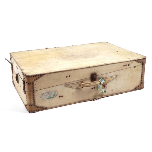 409 - An early 20th century Vellum suitcase, 80cm wide.