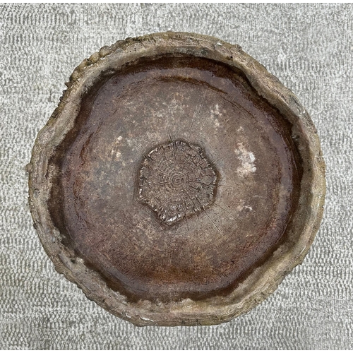 41 - A weathered stoneware bird bath, on a naturalist column, 62cm high.