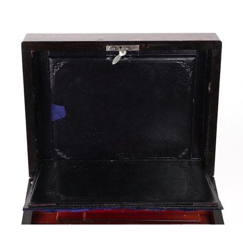 424 - A 19th century coromandel jewellery box, with fitted interior, 30cm wide.