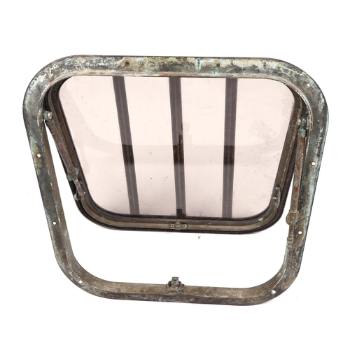 432 - Shipping interest; A brass porthole/ skylight, with bar slat window, 46 by 49cm.