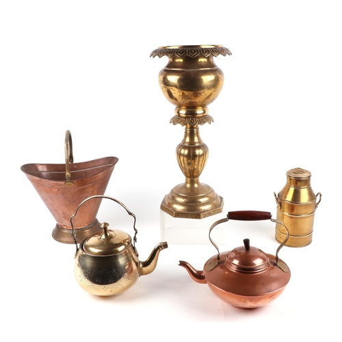 453 - A large quantity of copper and brass items, to include candlesticks, vases, a miniature milk churn a... 