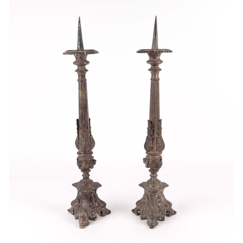 482 - A pair of gothic revival silver plated pricket candle sticks, 56cm high (2).