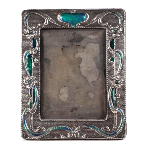 490 - An Art Nouveau style silver and enamel strut photograph frame, Chester 1932, overall 15 by 19cm.