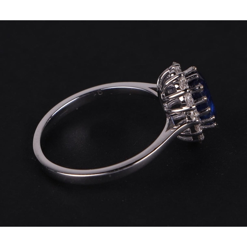 522 - A certificated 18ct white gold oval Kyanite and diamond cluster ring, Kyanite approx 1.77ct, approx ... 