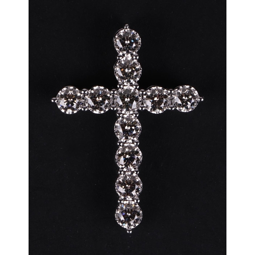 524 - A certificated 9ct white gold diamond cross pendant, diamonds approx 2.14ct, certificate number WGI9... 