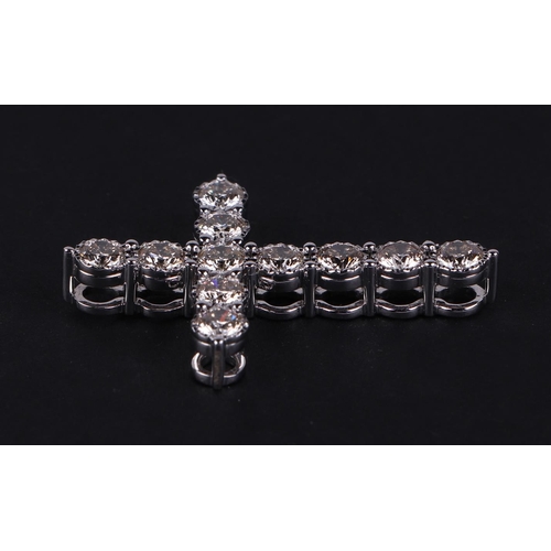 524 - A certificated 9ct white gold diamond cross pendant, diamonds approx 2.14ct, certificate number WGI9... 