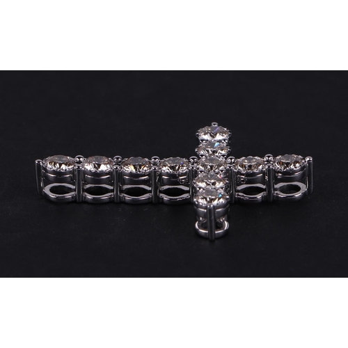 524 - A certificated 9ct white gold diamond cross pendant, diamonds approx 2.14ct, certificate number WGI9... 