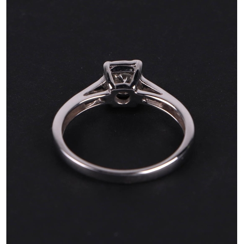 525 - A certificated 9ct white gold diamond solitaire ring, diamond approx 0.30ct, approx UK size K.