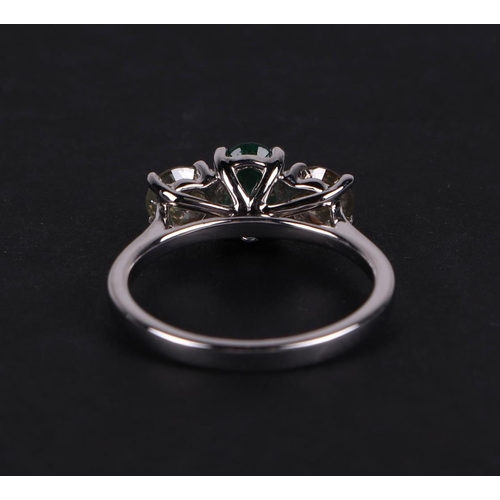 528 - A certificated 18ct white gold, emerald and diamond trilogy ring, emerald approx 0.66ct, diamond app... 