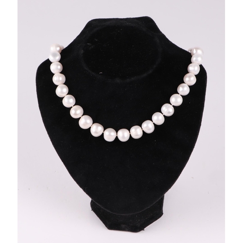 529 - A cultured pearl bead necklace, with 9ct white gold ball clasp, 45cm long, pearls each approx 15mm d... 