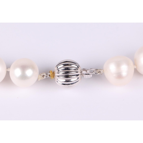 529 - A cultured pearl bead necklace, with 9ct white gold ball clasp, 45cm long, pearls each approx 15mm d... 